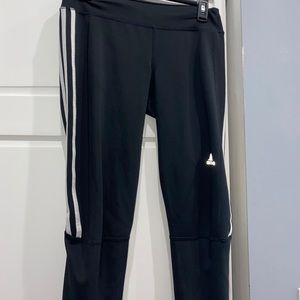 Adidas leggings with zippers at ankels.